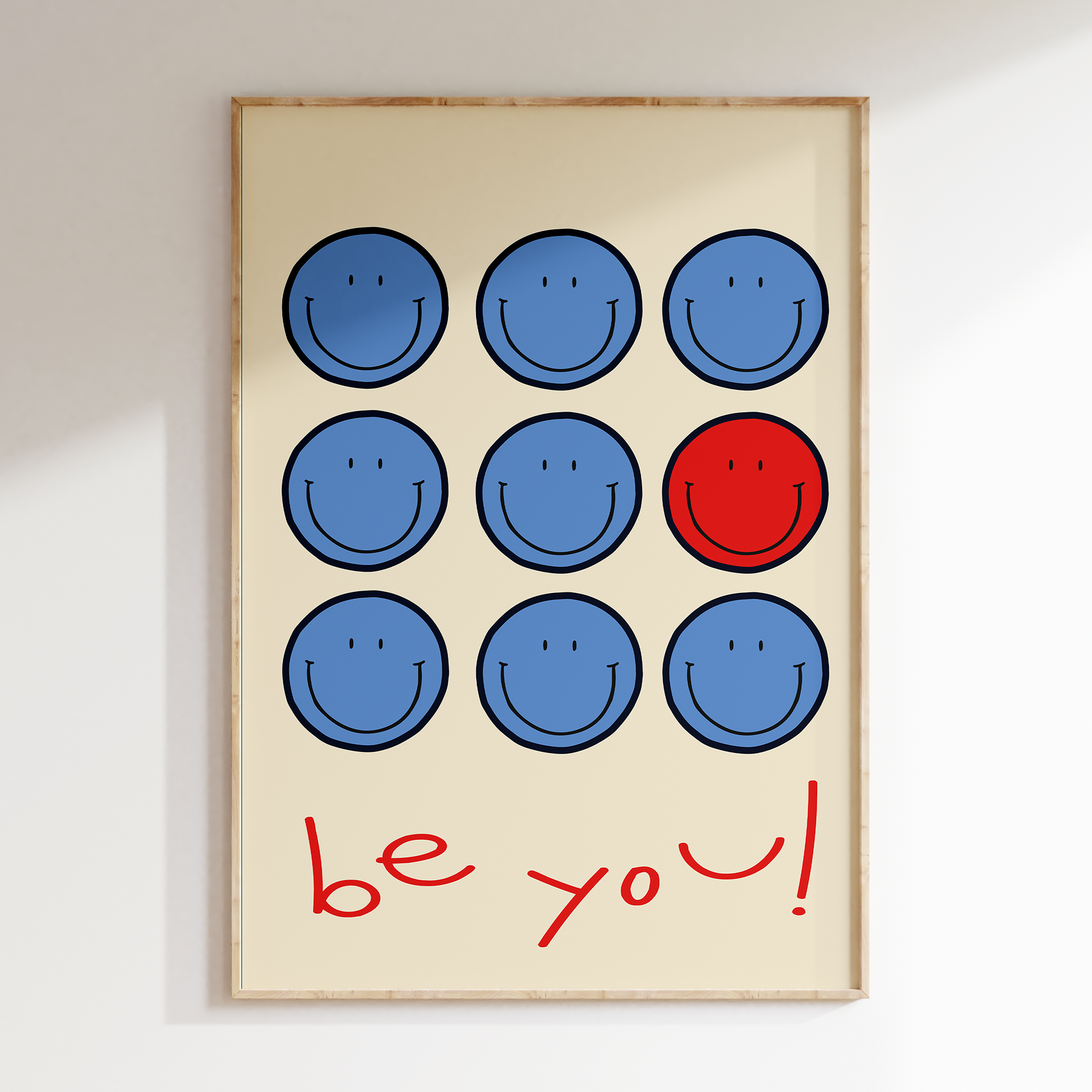 a picture of a smiley face on a white wall