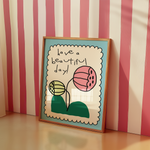 a picture frame with a picture of a flower on it