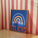 a picture frame with a picture of a rainbow on it