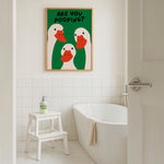 Bathroom with a humorous poster of ducks and a bathtub.