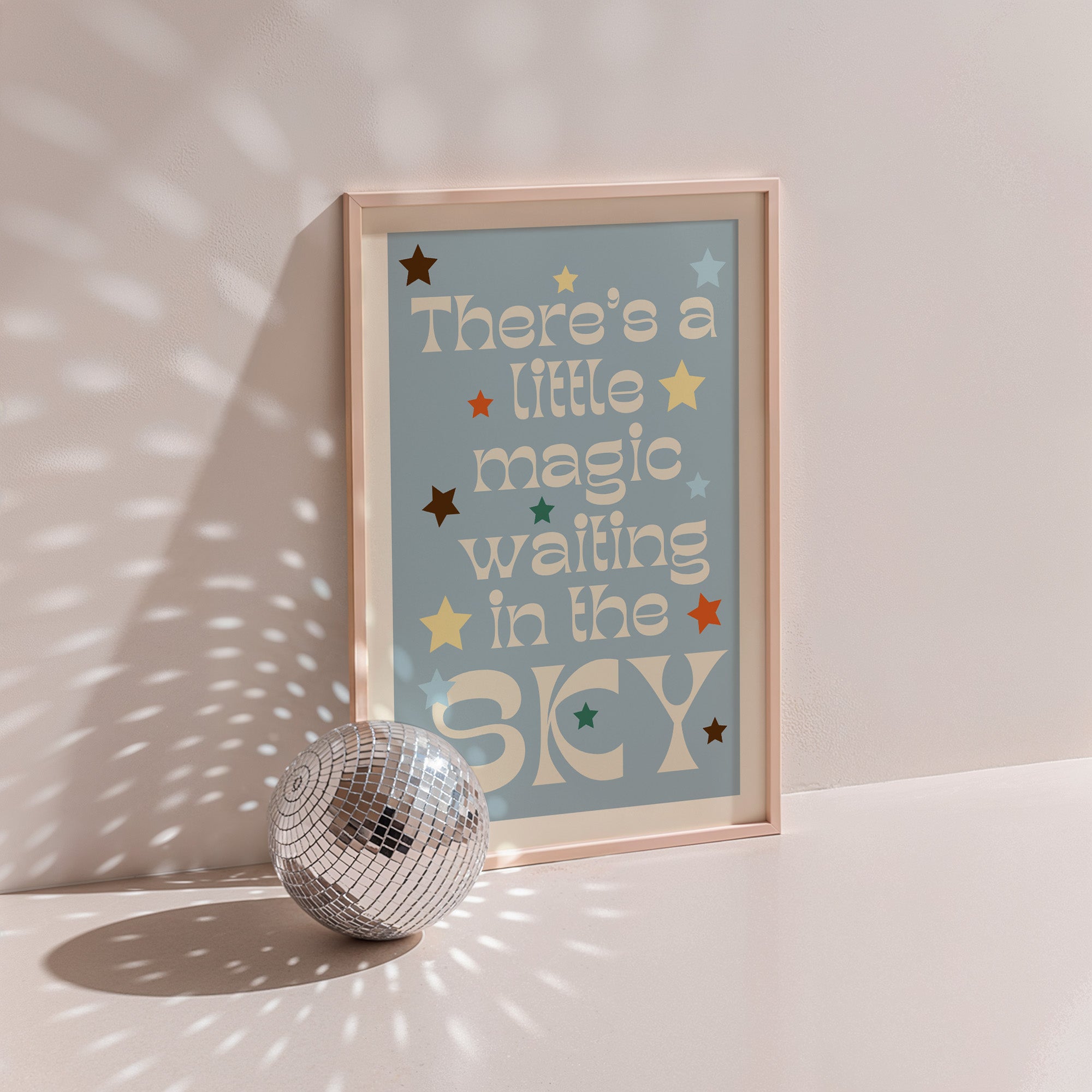 Little Magic retro print in oak frame, cream lettering with coloured stars on blue-grey