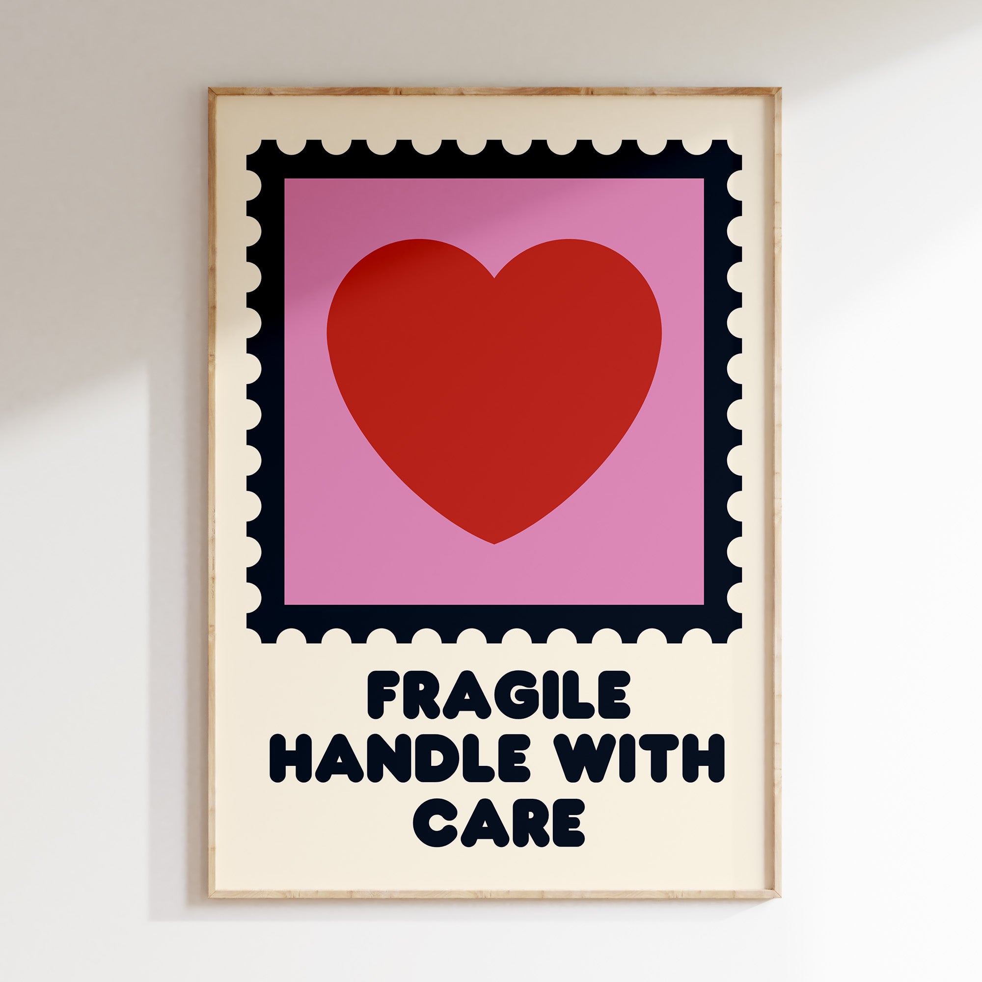 Fragile Handle With Care retro print in oak frame, postage stamp frame with red heart on pink and cream
