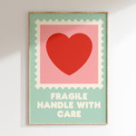 Fragile Handle With Care retro print in oak frame, postage stamp frame with red heart on pink and green