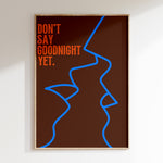 Don't Say Goodnight Yet retro print in oak frame, blue line-drawn faces with orange lettering on brown