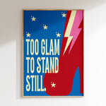 Too Glam retro print in oak frame, red platform boot with lightning bolt on blue
