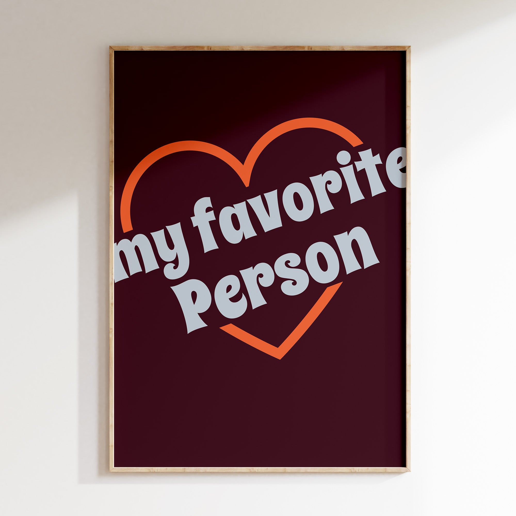 My Favorite Person retro print in oak frame, orange heart outline with grey lettering on burgundy
