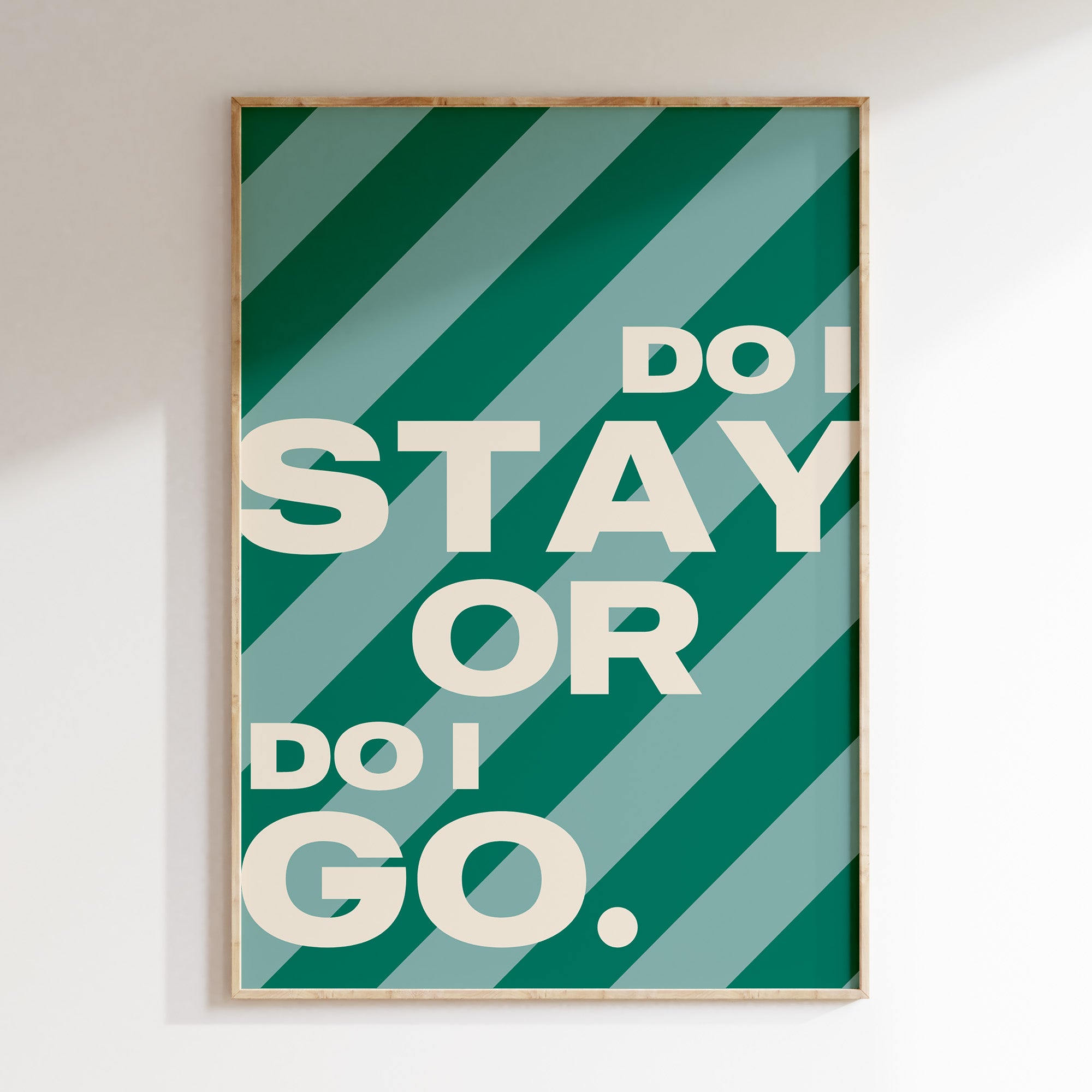 Do I Stay or Do I Go retro print in oak frame, bold cream lettering on candy greeen stripes