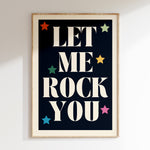 Let Me Rock You retro print in oak frame, cream serif lettering with multicoloured stars on navy