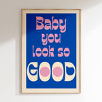 Baby You Look So Good retro print in oak frame, pink and cream bubble lettering on cobalt