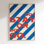 Do I Stay or Do I Go retro print in oak frame, bold red lettering on candy blue stripes