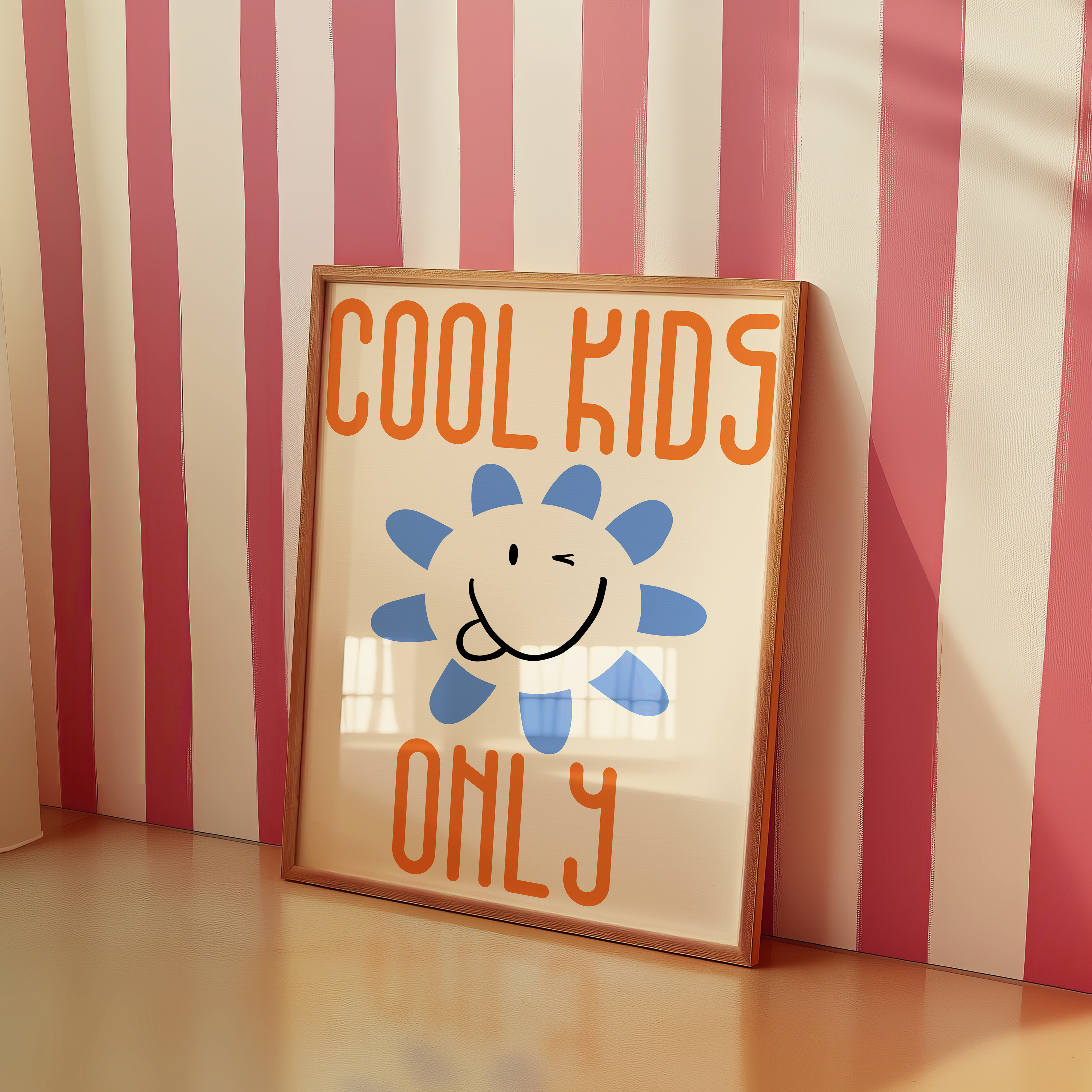 a picture frame sitting on a table next to a striped wall
