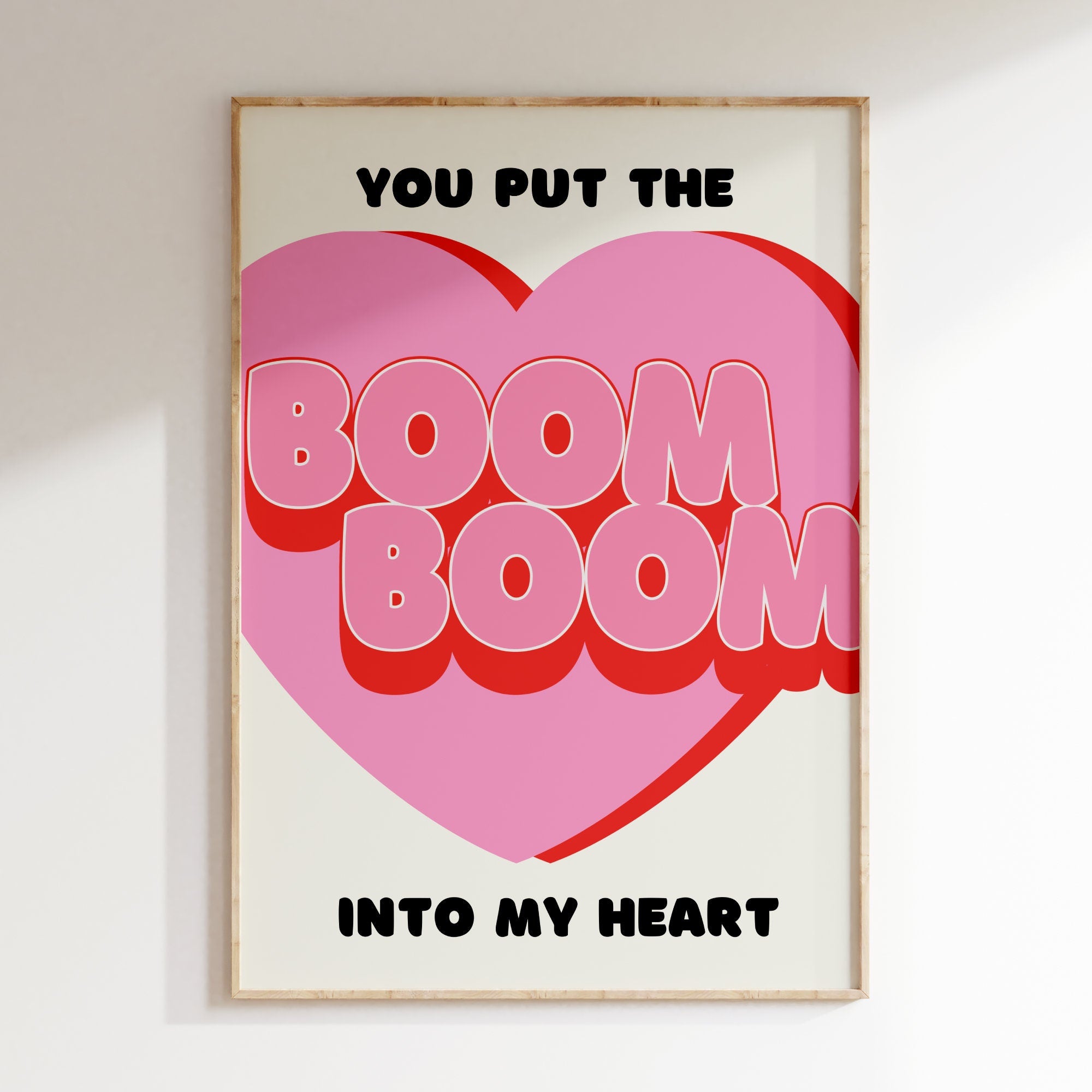 Boom Boom Into My Heart retro print in oak frame, pink heart with bubble lettering on cream