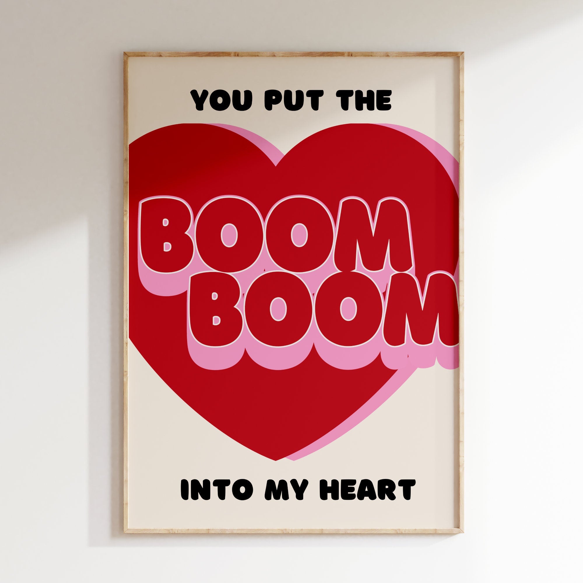 Boom Boom Into My Heart retro print in oak frame, red heart with bubble lettering on cream