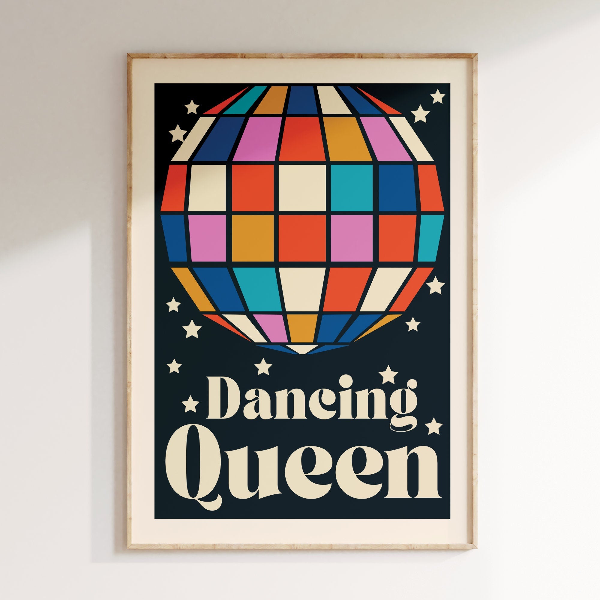 Dancing Queen retro print in oak frame, navy background with multicoloured disco ball
